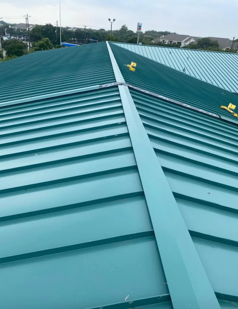 Green commercial metal roof ridge and valley for Metal Roof Repair in Decatur