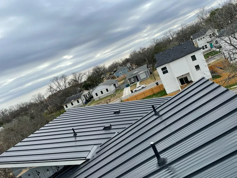 Standing seam metal roof panels with vents for Skylight Repair in Decatur